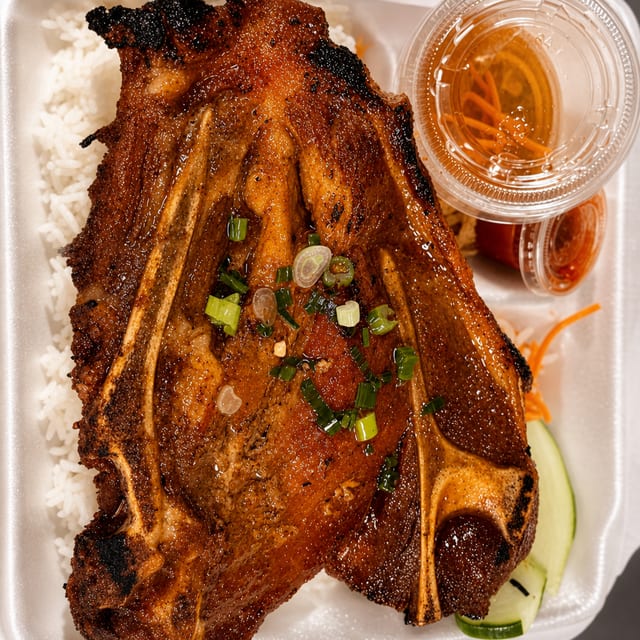64. Cơm Tấm Thịt Nướng- Grilled Pork Chop.